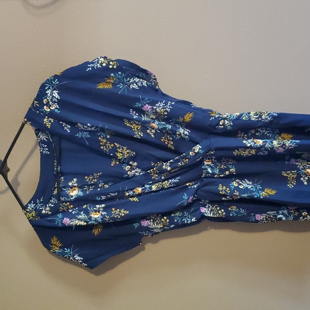 Timing blue romper with flowers and pockets junior size med